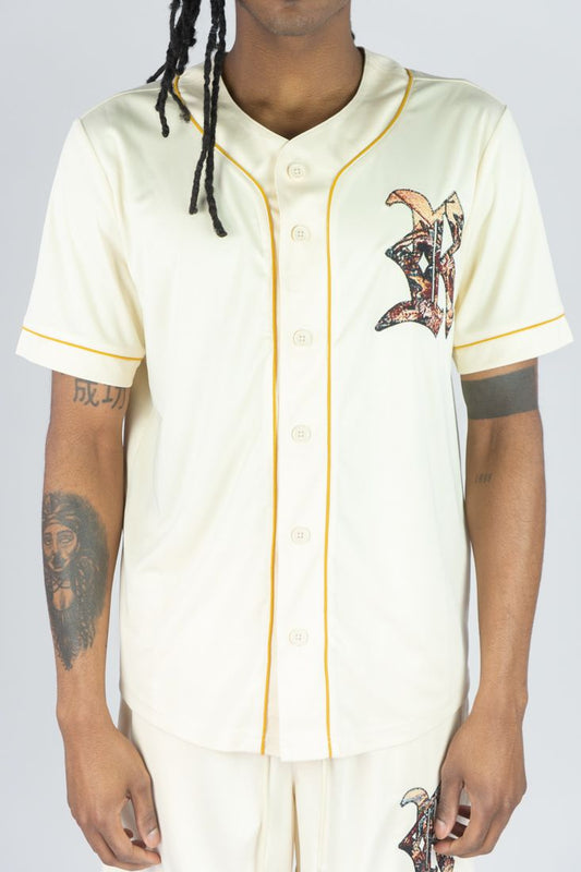 Person wearing a cream-colored baseball jersey with yellow accents on a white background
