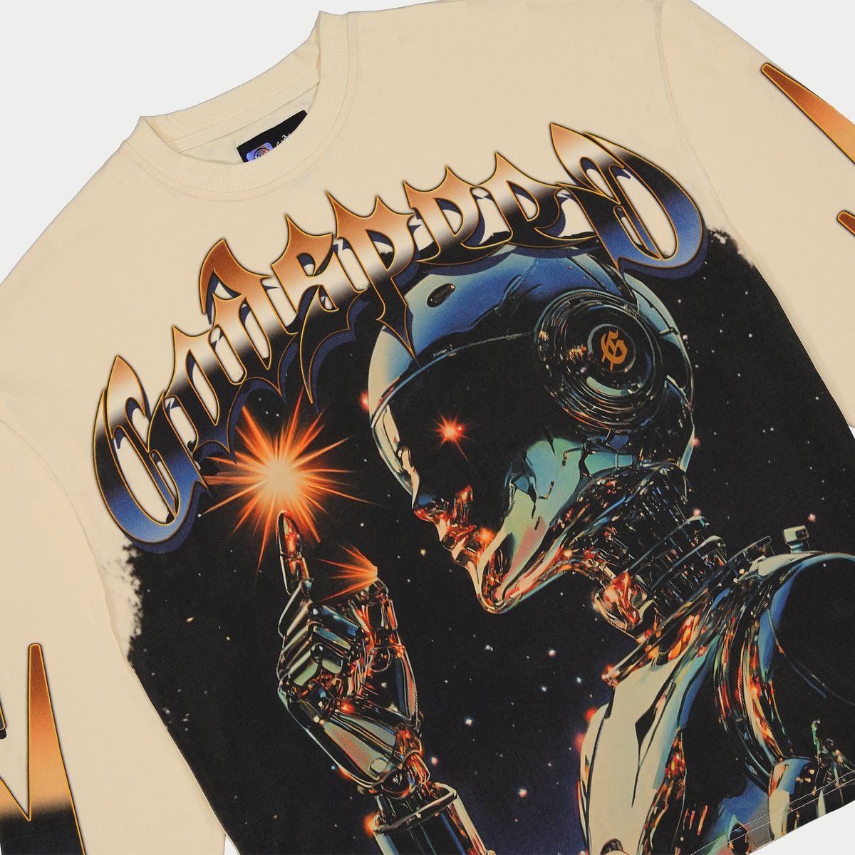 Beige sweatshirt with a robot graphic and 'Commando' text on a white background