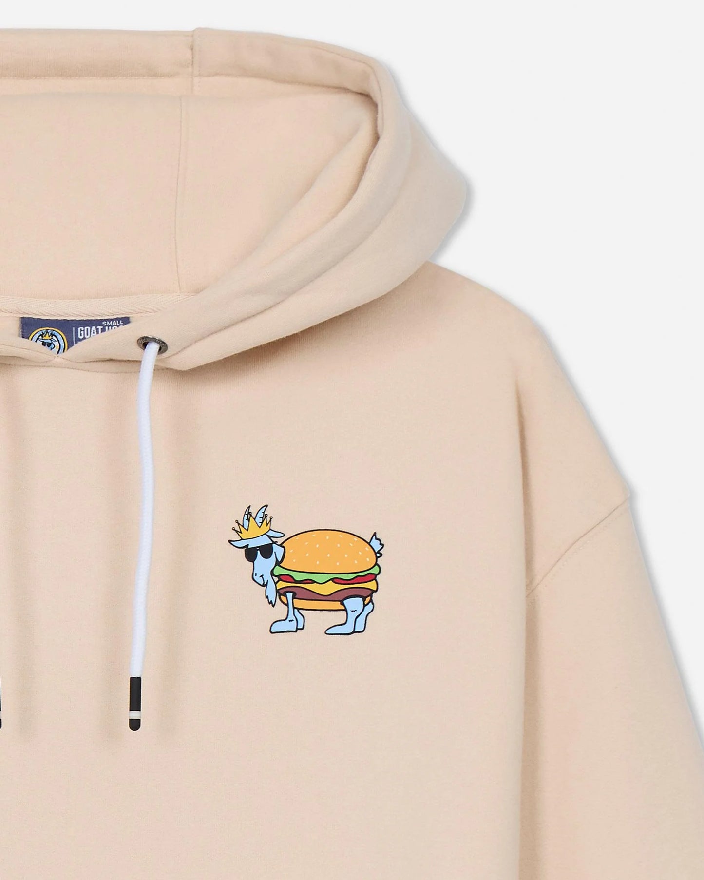 Beige hoodie with a cartoon hamburger design on a white background