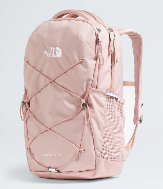 A pink women's backpack with a visible brand logo, featuring a structured design, multiple compartments, and adjustable straps.