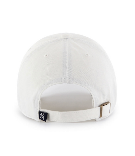 A rear view of a white baseball cap with a navy blue "NY" logo on the adjustable strap, featuring a metal buckle closure.