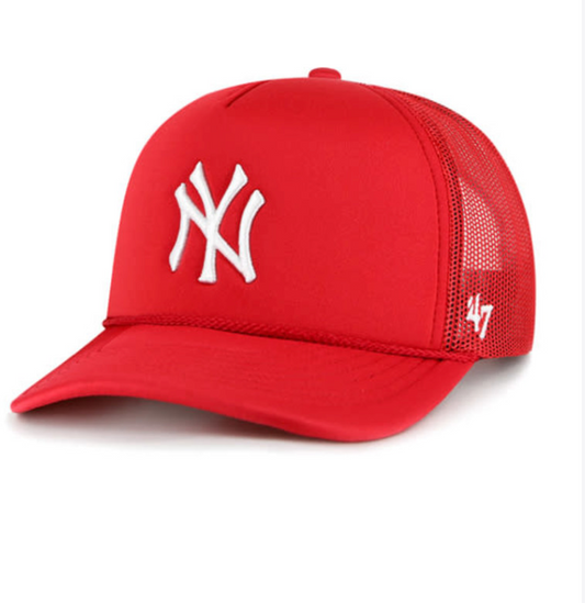 A red '47 brand mesh trucker hat with the New York Yankees logo embroidered on the front.