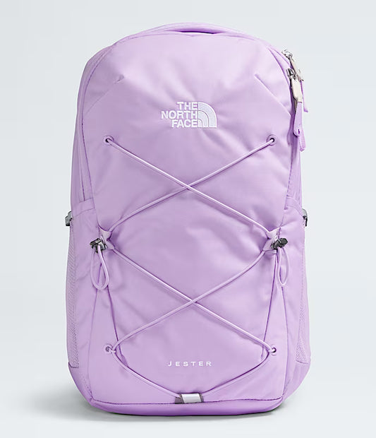 Purple backpack with 'The North Face' logo on a light gray background
