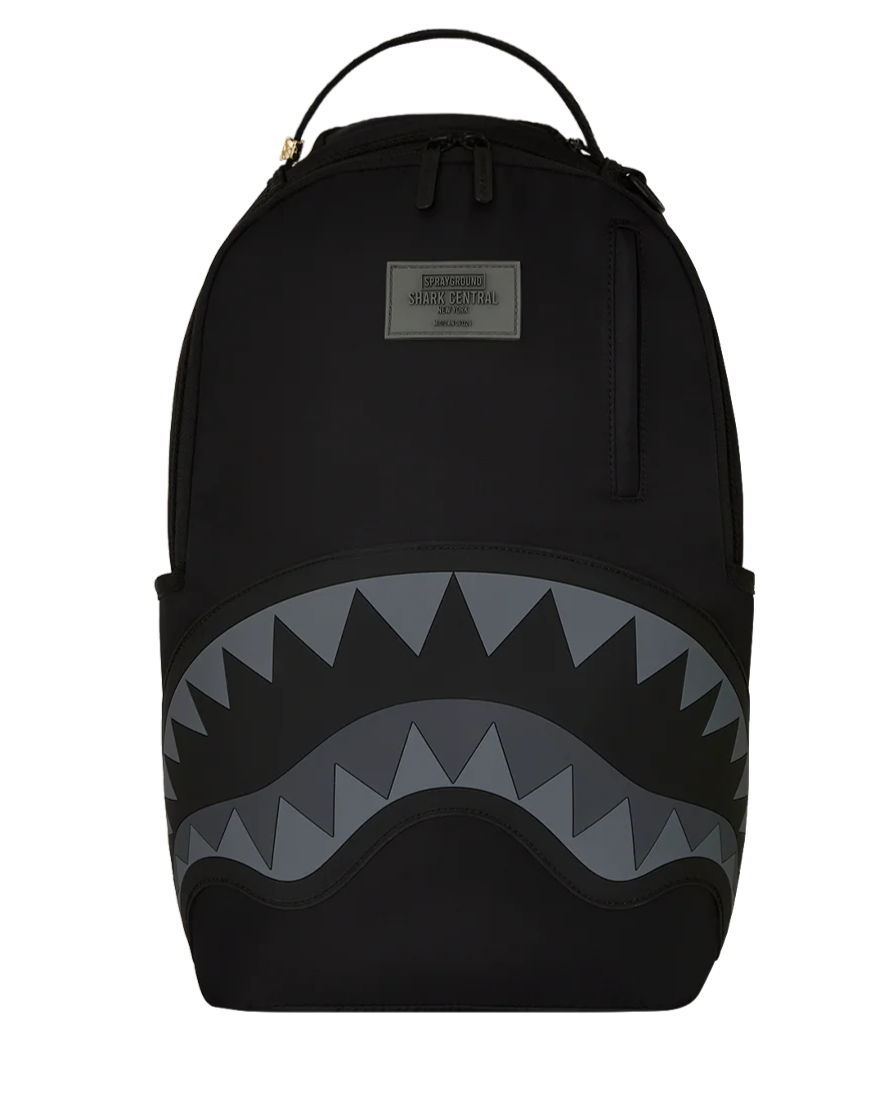 Black backpack with shark mouth design on a white background