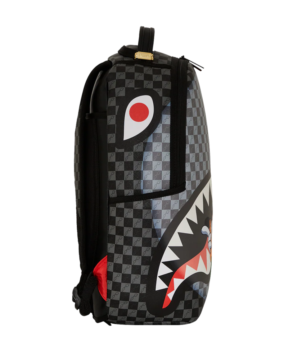 Backpack with checkered pattern and shark mouth design on a white background