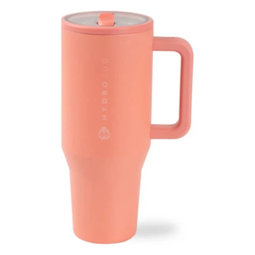 Coral-colored mug with handle on a white background