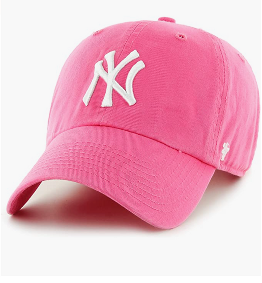 A pink '47 brand baseball cap with the New York Yankees logo embroidered on the front.