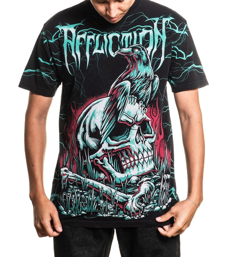 Person wearing a black t-shirt with a graphic design and 'Affliction' branding on a white background