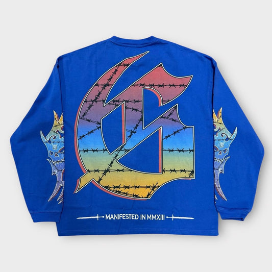 Blue long-sleeve shirt with colorful graphic design on a white background