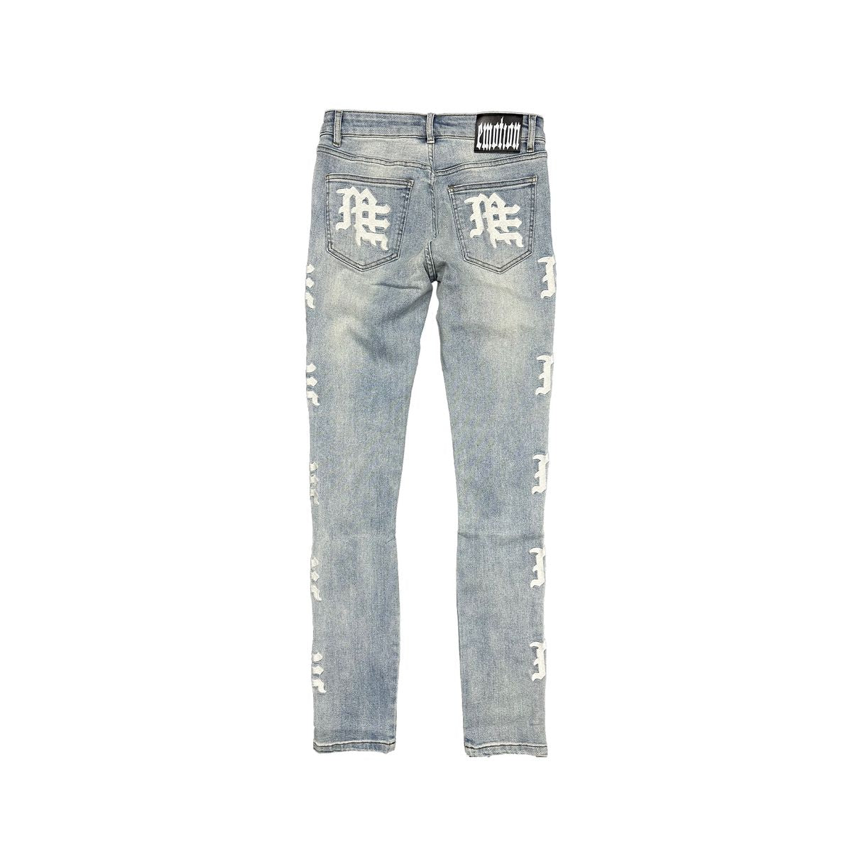 Light blue distressed jeans with white branding on a white background