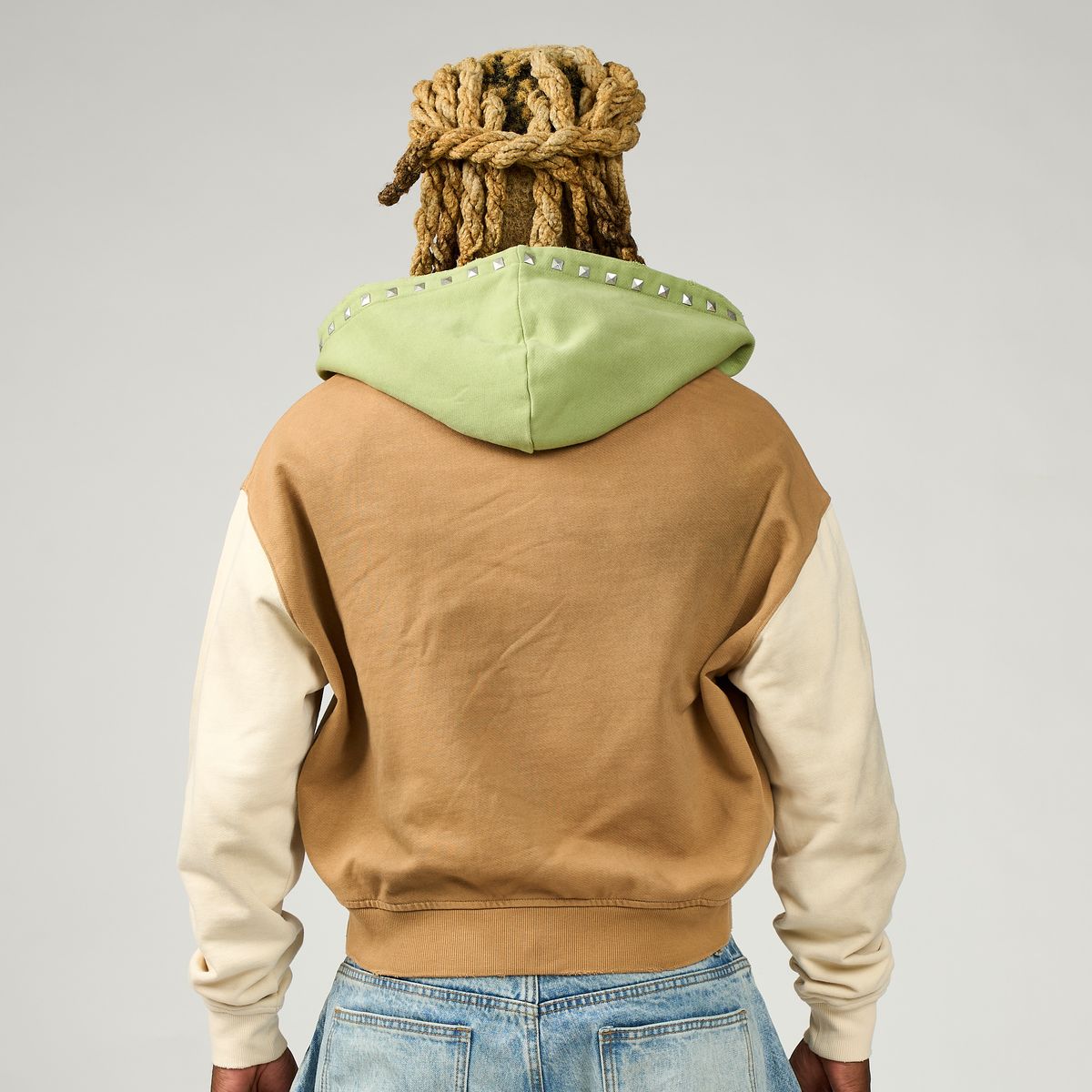 DUAA Traveler hoodie back view contrast hood detail
