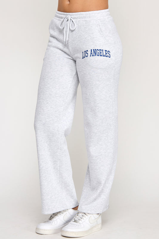 Gray sweatpants with 'Los Angeles' text on a white background