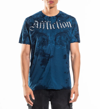 Person wearing a blue tie-dye t-shirt with 'Affliction' branding on a white background