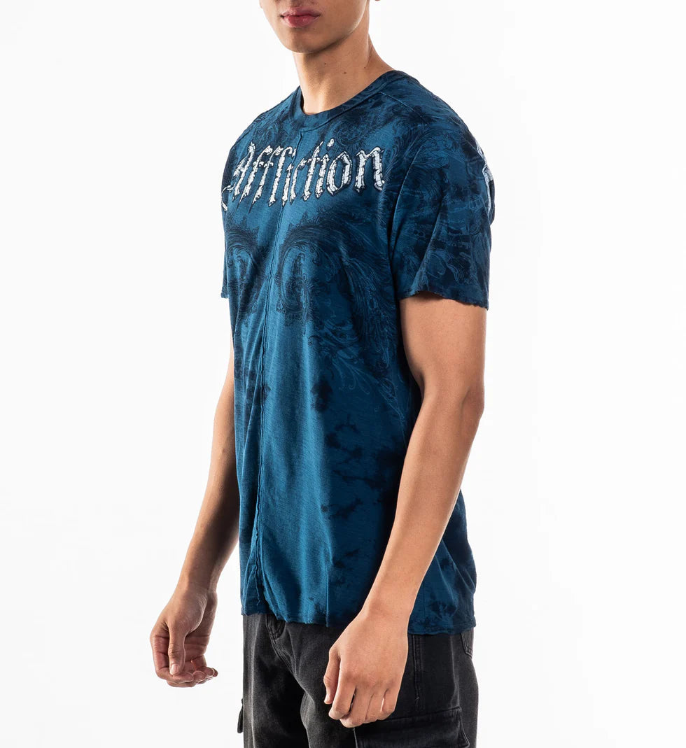 Person wearing a blue tie-dye t-shirt with 'Diffusion' logo on a white background