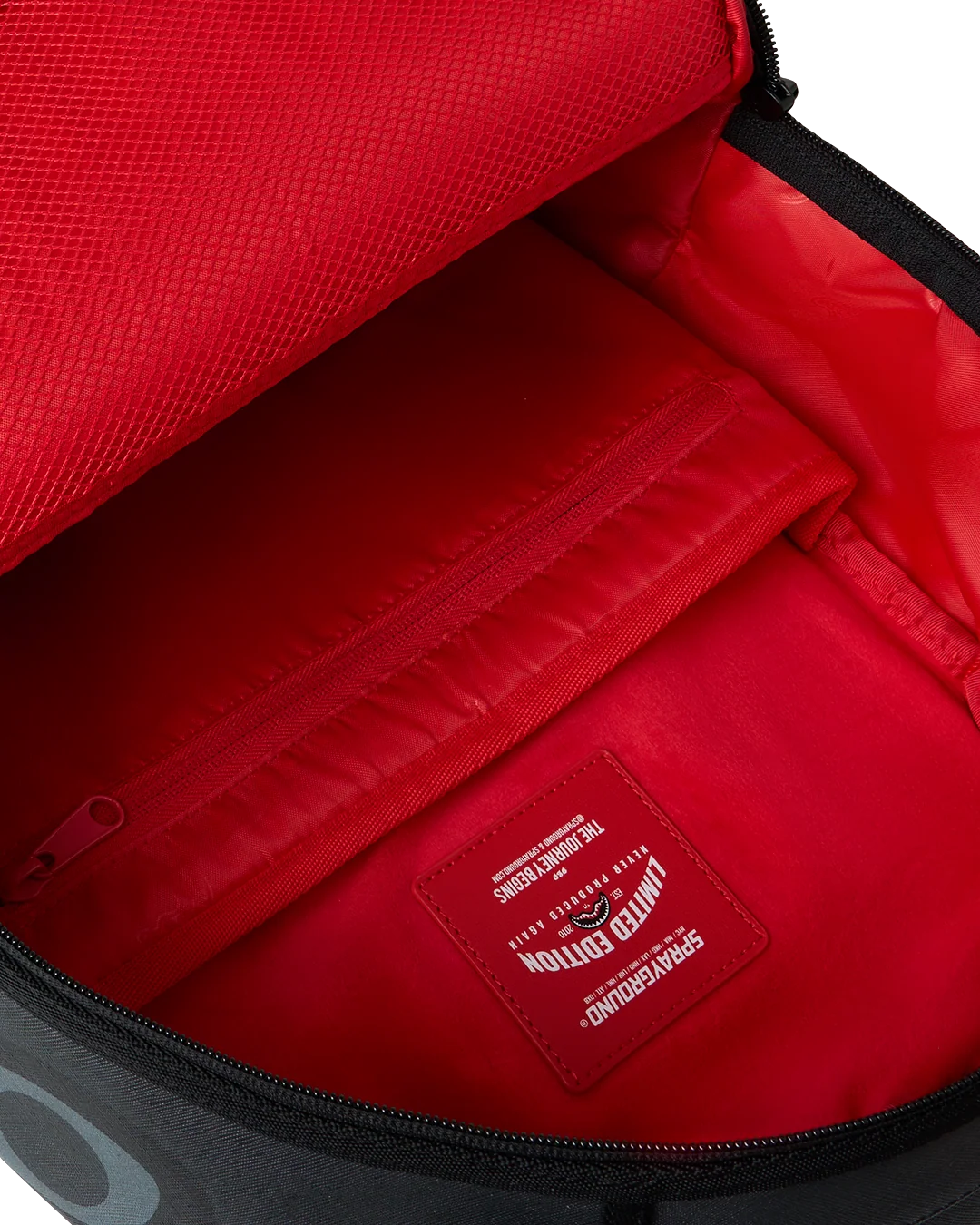 Sprayground Shark Slash Backpack inside