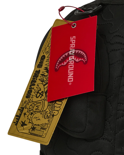 Sprayground Shark Central Kyushu Mountain Backpack tag