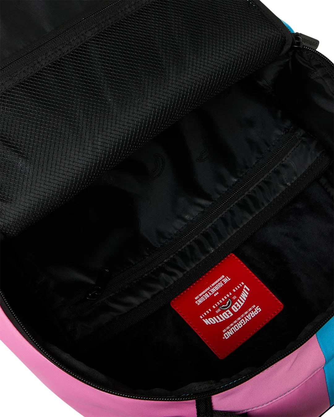 Sprayground Candy Clash Shark Central Backpack inside bag