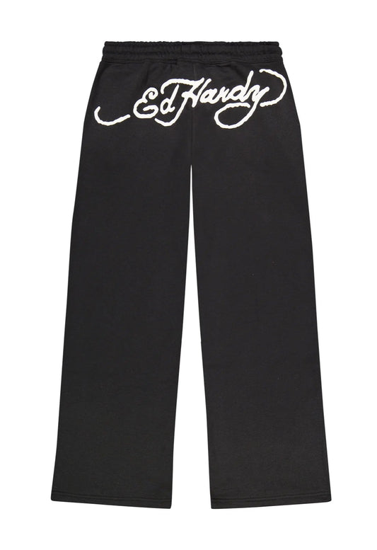 Black pants with white 'Ed Hardy' logo on a white background