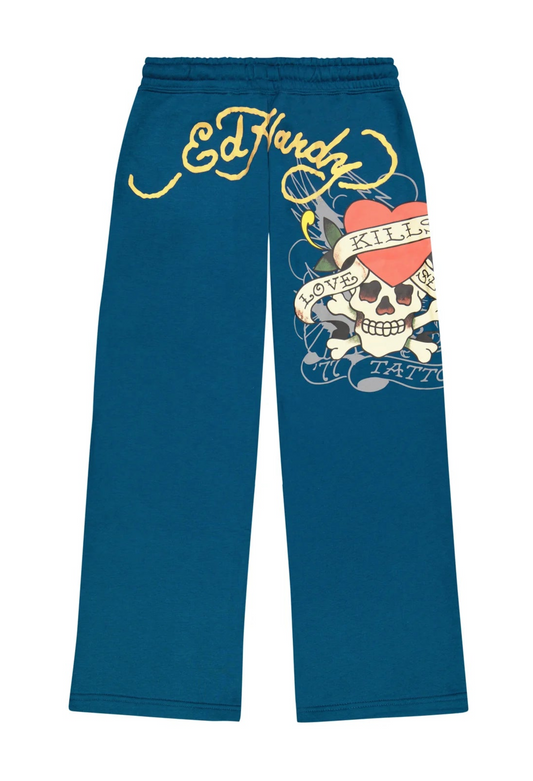 Blue pants with a graphic design and 'Ed Hardy' branding on a white background
