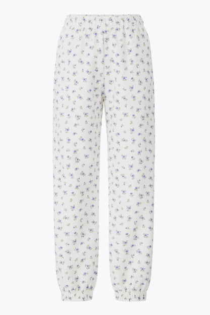 Floral-patterned pants on a white background