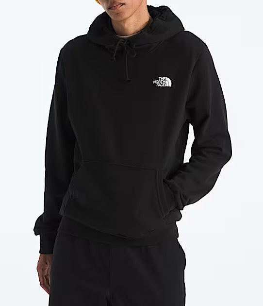 Person wearing a black hoodie with The North Face logo on a white background
