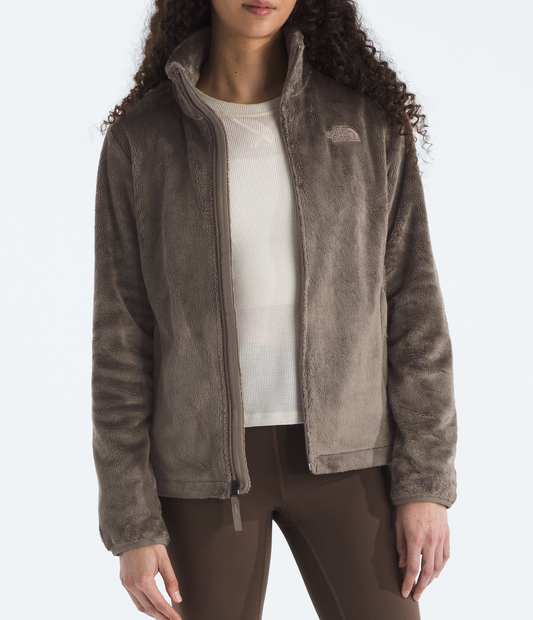 Person wearing a brown jacket on a white background