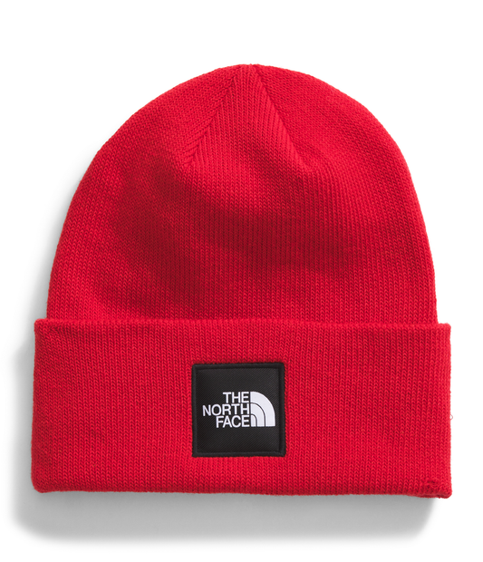 Red knit beanie with The North Face logo on a white background