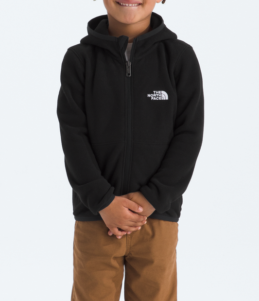 Child wearing a black hoodie with a logo and brown pants on a white background