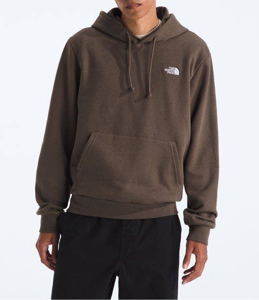 Person wearing a brown hoodie with a logo on a white background 