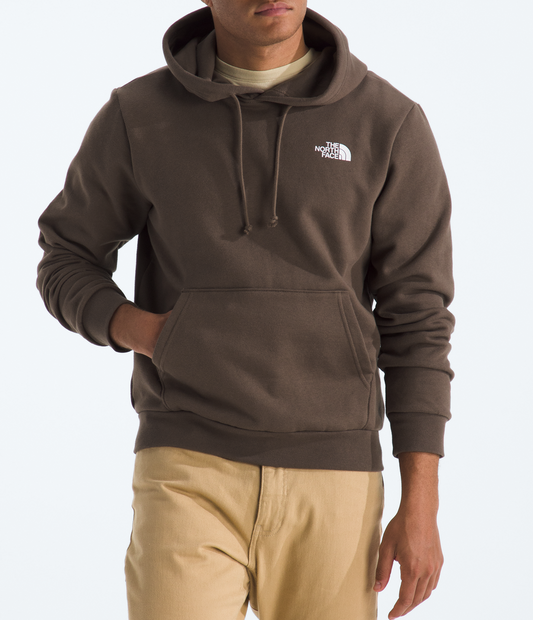 Person wearing a brown hoodie with a logo on a white background