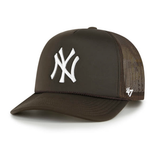 A black '47 Mesh Trucker cap with a raised white New York Yankees logo on the front and a snapback closure.