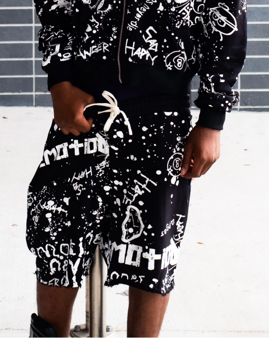 Mixed Emotion black graffiti streetwear shorts with allover white graphic artwork and paint splatter design