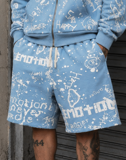 Mixed Emotion blue graffiti streetwear shorts with allover white graphic artwork and paint splatter design