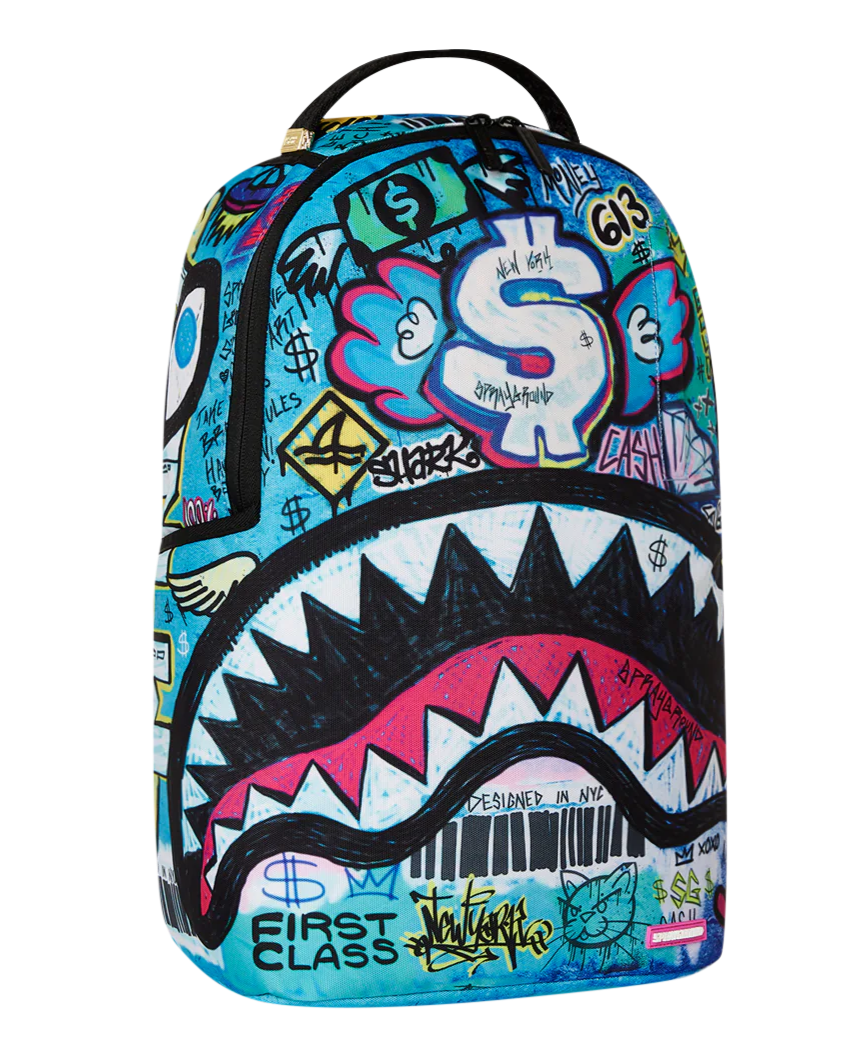 Colorful backpack with shark design and graffiti-style graphics on a white background