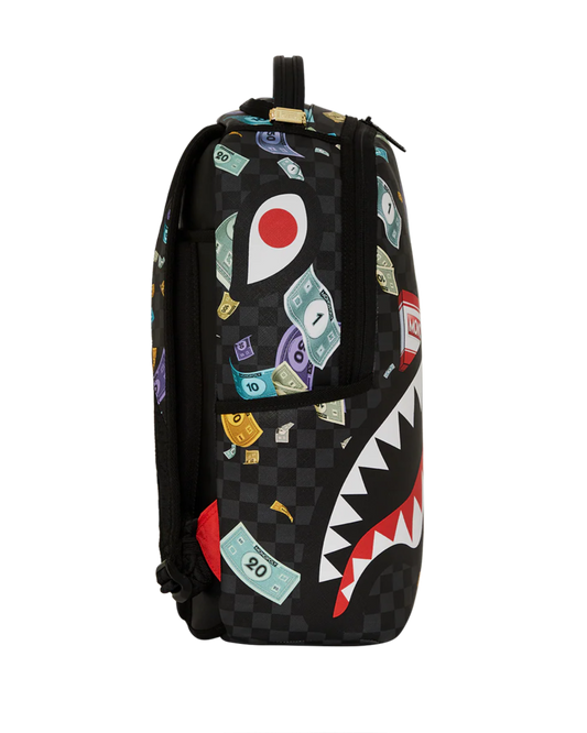 Backpack with colorful shark design on a checkered background
