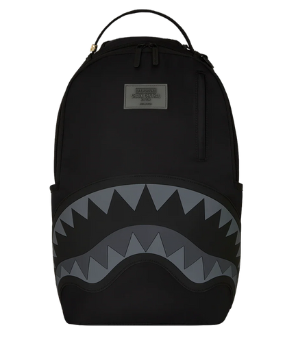 Black backpack with shark mouth design on a white background