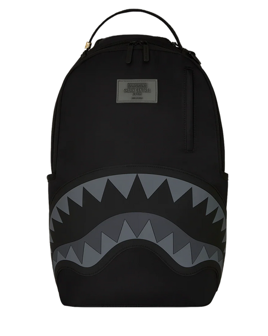 Black backpack with shark mouth design on a white background