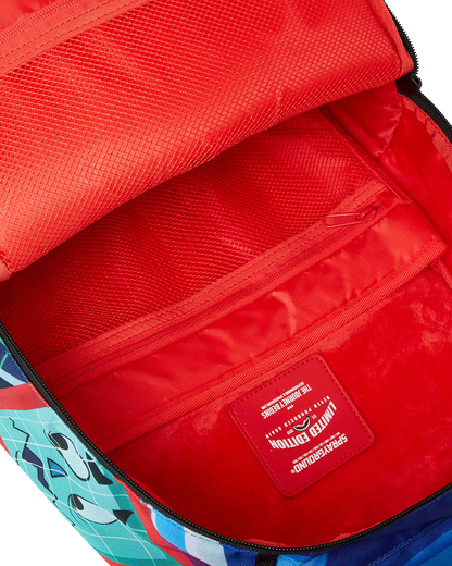 Red backpack with a visible brand logo on a multicolored background