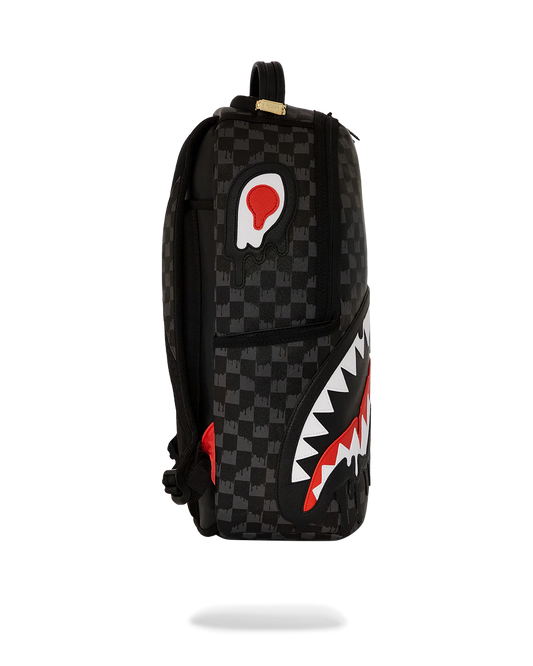 Black checkered backpack with a shark mouth design on a white background