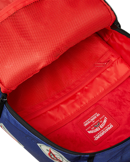 Red backpack interior with a visible brand label on a white background