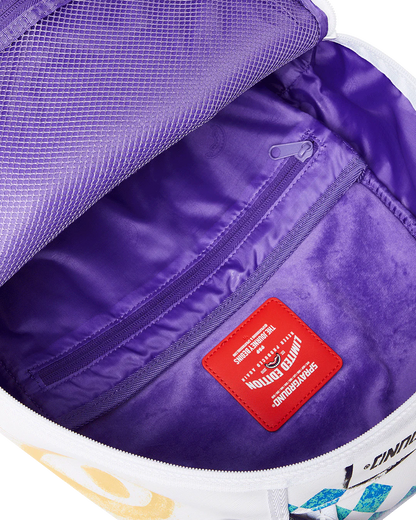 Close-up of a purple bag with a red label and visible brand logo.