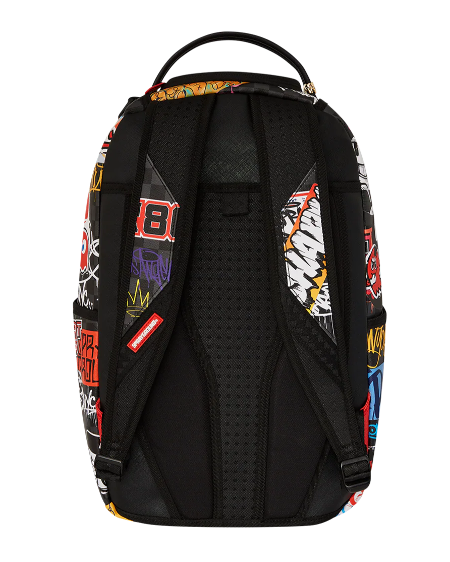 Black backpack with colorful patches on a white background