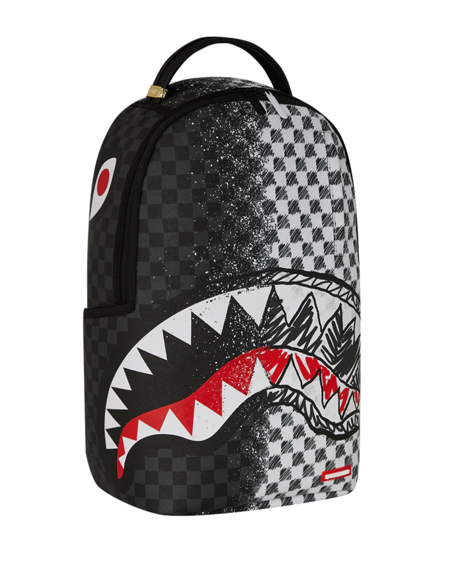 Backpack with shark mouth design and checkered pattern on a white background