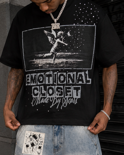Mixed Emotion black graphic tee with Emotional Closet artwork, distressed lettering, angel graphics, and rhinestone-inspired streetwear details